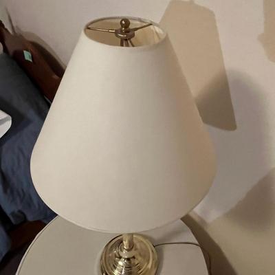 3 leg table with brass lamp
