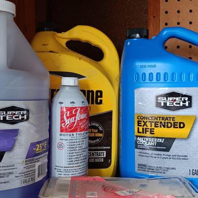 Variety of Automobile chemicals full to mostly full