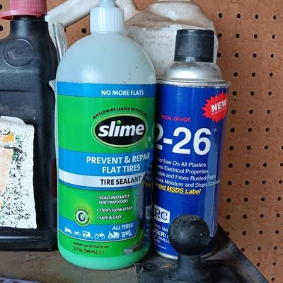 Variety of Automobile chemicals full to mostly full