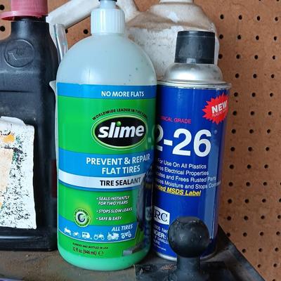 Variety of Automobile chemicals full to mostly full