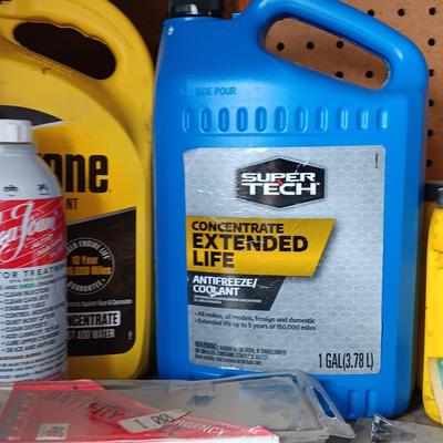 Variety of Automobile chemicals full to mostly full