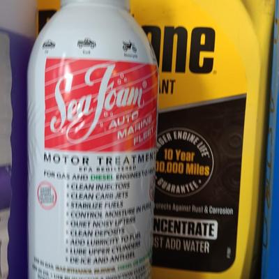 Variety of Automobile chemicals full to mostly full