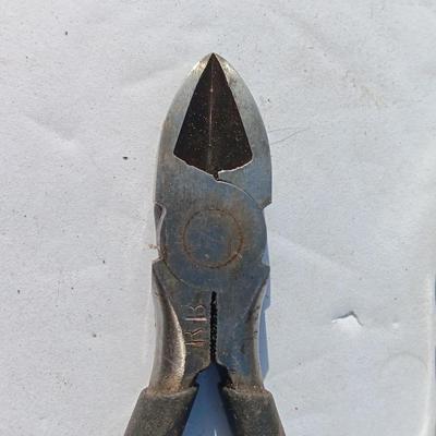 Assortment of black handled Pliers