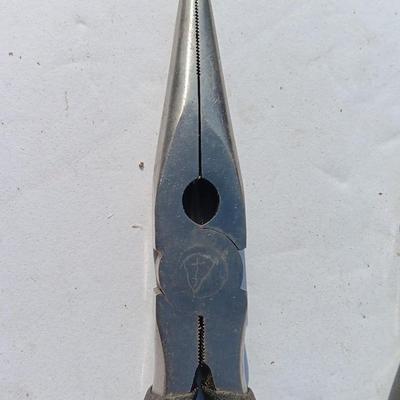 Assortment of black handled Pliers