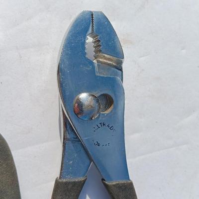 Assortment of black handled Pliers