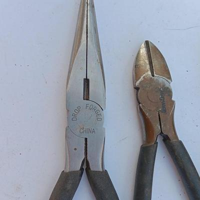 Assortment of black handled Pliers