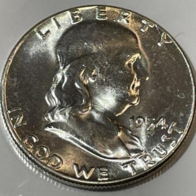 1954 Choice Uncirculated Condition Franklin Silver Half Dollar (MS64/65 Quality).