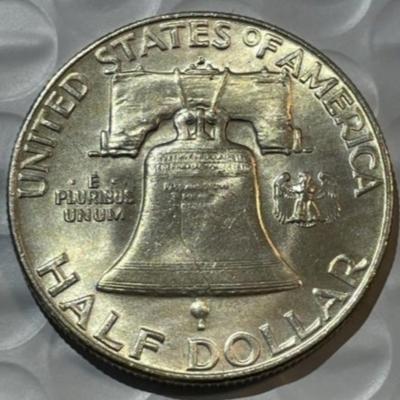 1952-D BRILLIANT UNCIRCULATED CONDITION FRANKLIN SILVER HALF DOLLAR AS PICTURED.