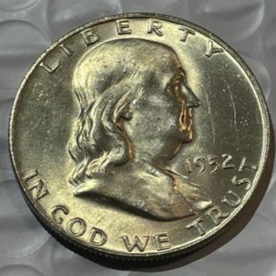 1952-D BRILLIANT UNCIRCULATED CONDITION FRANKLIN SILVER HALF DOLLAR AS PICTURED.