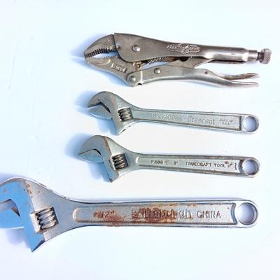 Adjustable wrenches and vise clamps