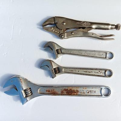 Adjustable wrenches and vise clamps