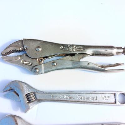 Adjustable wrenches and vise clamps