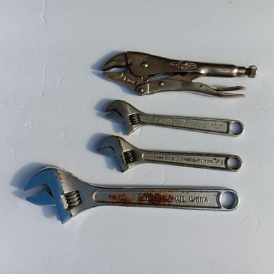 Adjustable wrenches and vise clamps