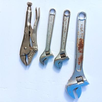 Adjustable wrenches and vise clamps
