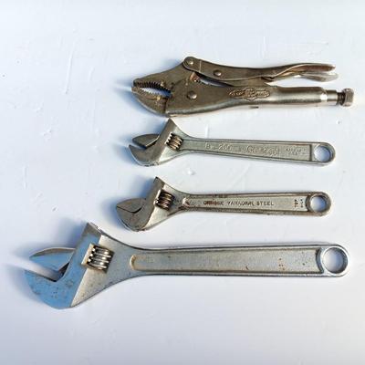 Adjustable wrenches and vise clamps