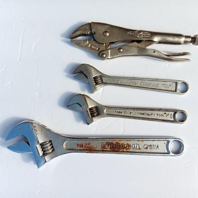 Adjustable wrenches and vise clamps
