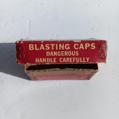 Vintage smokeless powder metal can and blasting caps empty box