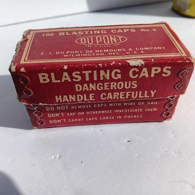 Vintage smokeless powder metal can and blasting caps empty box