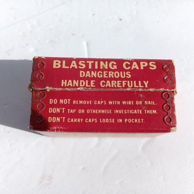 Vintage smokeless powder metal can and blasting caps empty box
