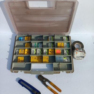 Organizer box with assortment of fuses and some hand tools