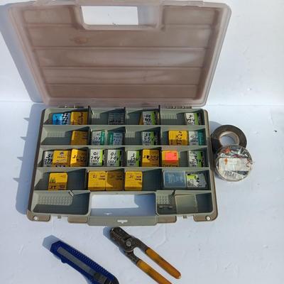 Organizer box with assortment of fuses and some hand tools