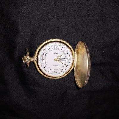 TWO POCKET WATCHES FEATURING DEER ON ONE AND FISH ON OTHER, MORE