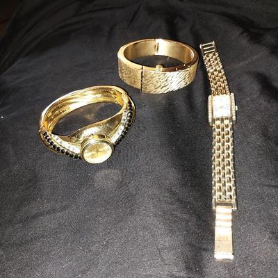 THREE LADIES GOLD TONE FASHION WATCHES