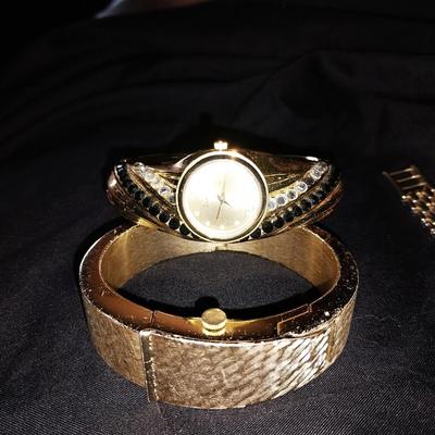 THREE LADIES GOLD TONE FASHION WATCHES