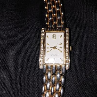 THREE LADIES GOLD TONE FASHION WATCHES