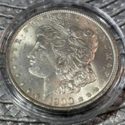 1900-P CHOICE UNCIRCULATED CONDITION MORGAN SILVER DOLLAR AS PICTURED.