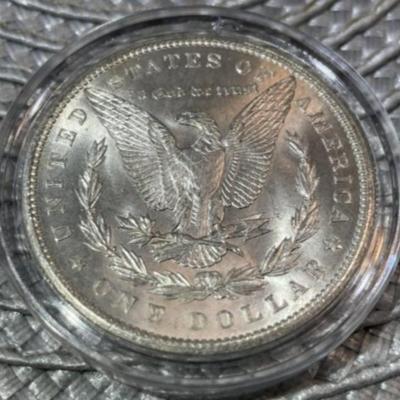 1900-P CHOICE UNCIRCULATED CONDITION MORGAN SILVER DOLLAR AS PICTURED.