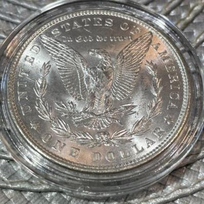 1882-P CHOICE UNCIRCULATED CONDITION MORGAN SILVER DOLLAR AS PICTURED.