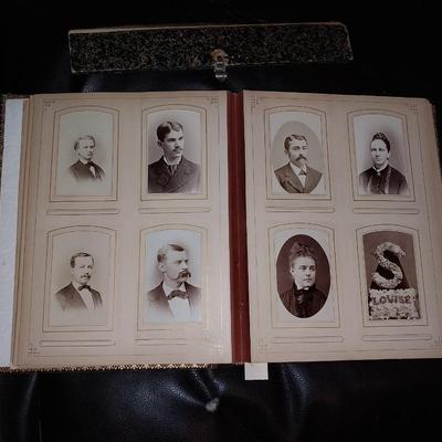 OLD PHOTOS IN A COOL LEATHETR HOLDER