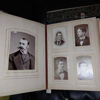 OLD PHOTOS IN A COOL LEATHETR HOLDER