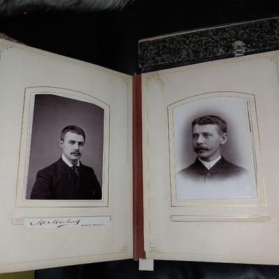 OLD PHOTOS IN A COOL LEATHETR HOLDER