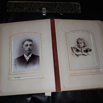 OLD PHOTOS IN A COOL LEATHETR HOLDER