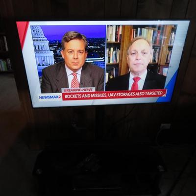 Samsung 50" Flat Screen TV on Stand , Panasonic Sound Bar, and Toshiba DVD & VHS combo Player - Like New