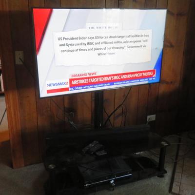 Samsung 50" Flat Screen TV on Stand , Panasonic Sound Bar, and Toshiba DVD & VHS combo Player - Like New