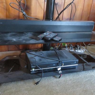 Samsung 50" Flat Screen TV on Stand , Panasonic Sound Bar, and Toshiba DVD & VHS combo Player - Like New