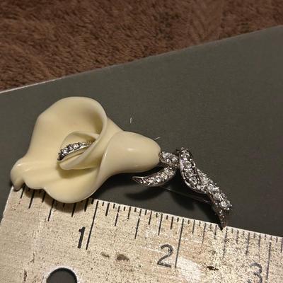 Nolan, Miller, flower, brooch, and rhinestone earrings, estate lot