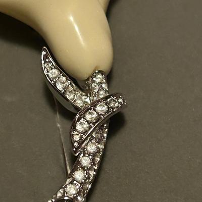 Nolan, Miller, flower, brooch, and rhinestone earrings, estate lot