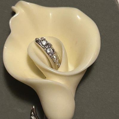 Nolan, Miller, flower, brooch, and rhinestone earrings, estate lot