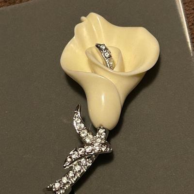 Nolan, Miller, flower, brooch, and rhinestone earrings, estate lot