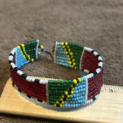 The state jewelry lot of four beaded bracelets.