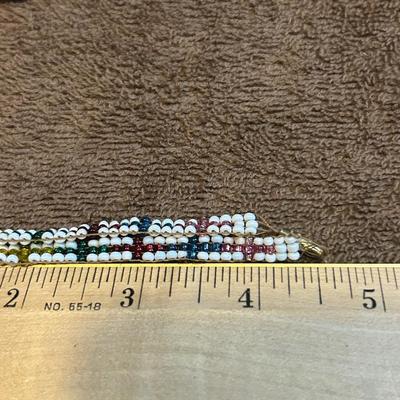 The state jewelry lot of four beaded bracelets.