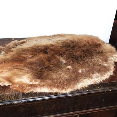 SMALL ANIMAL PELT AND TWO ARTIFACTS FROM BONE