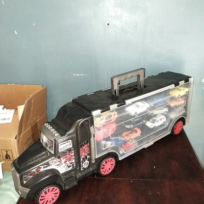 SEMI TRUCK CAR HOLDER FILLED WITH HOTWHEELS/MATCHBOX CARS ON BOTH SIDES
