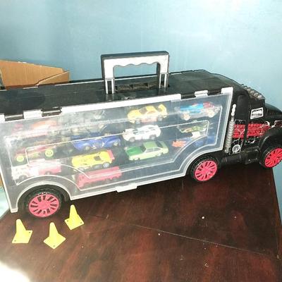 SEMI TRUCK CAR HOLDER FILLED WITH HOTWHEELS/MATCHBOX CARS ON BOTH SIDES