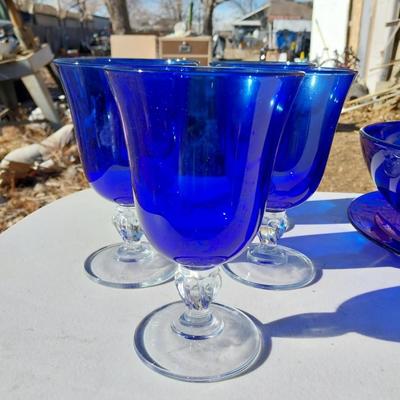 BLUE GLASS SERVING BOWL AND DRINKING GLASSES