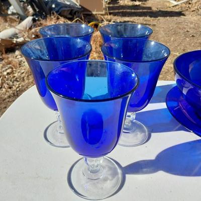 BLUE GLASS SERVING BOWL AND DRINKING GLASSES